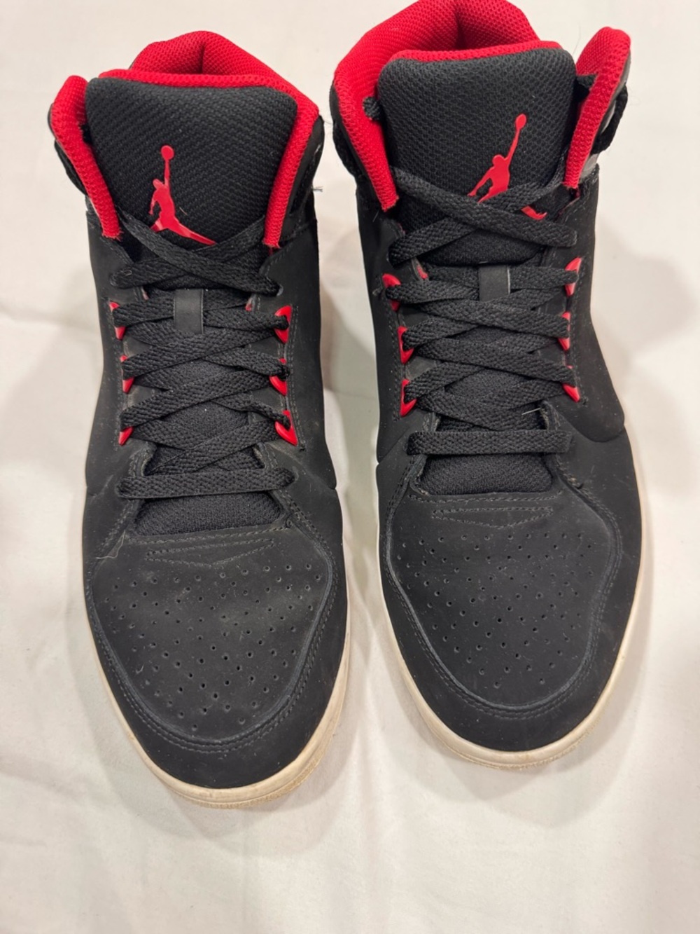 Nike Air Jordan 1 Mid in black and red (Bred colorway). Men’s size 12.